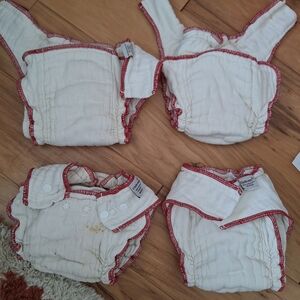 Four Used Cloth Eez Workhorsesl Fitted Diapers.